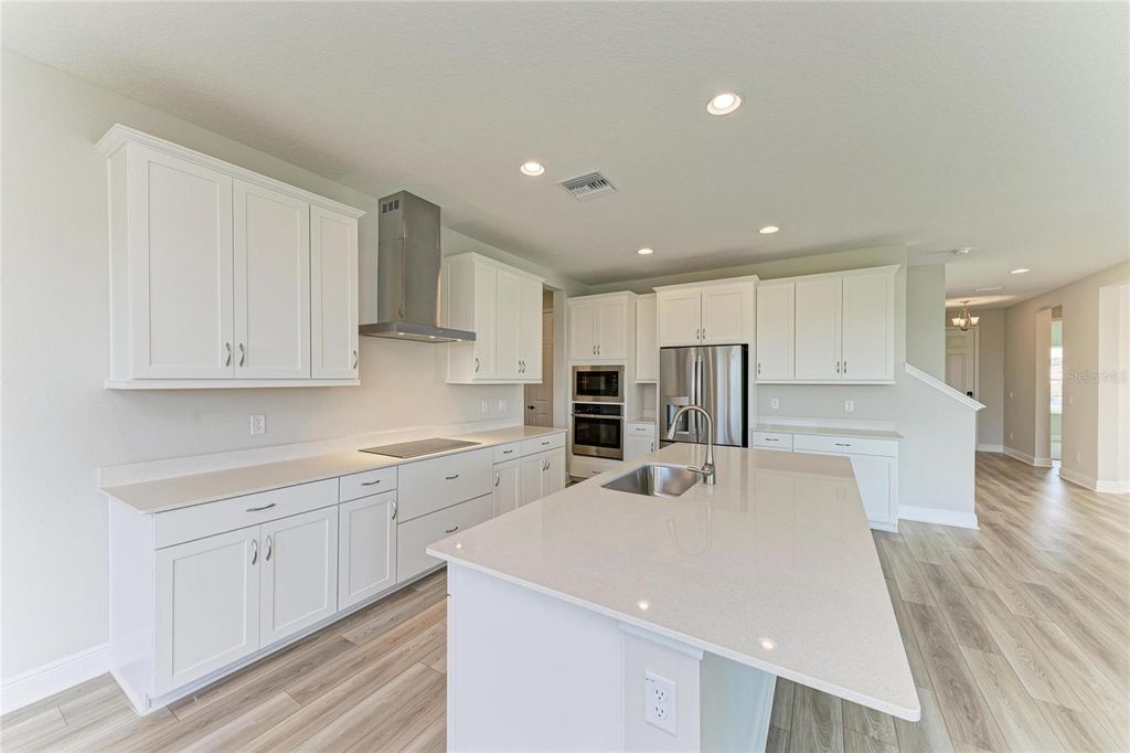Photo of 9723 Surrey Rose Drive, San Antonio, FL 33576 (MLS # TB8441485)