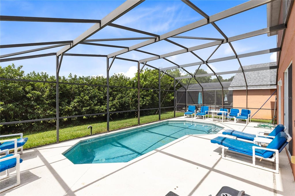 Photo of 180 Hideaway Beach Lane, Kissimmee, FL 34746 (MLS # O6421854)