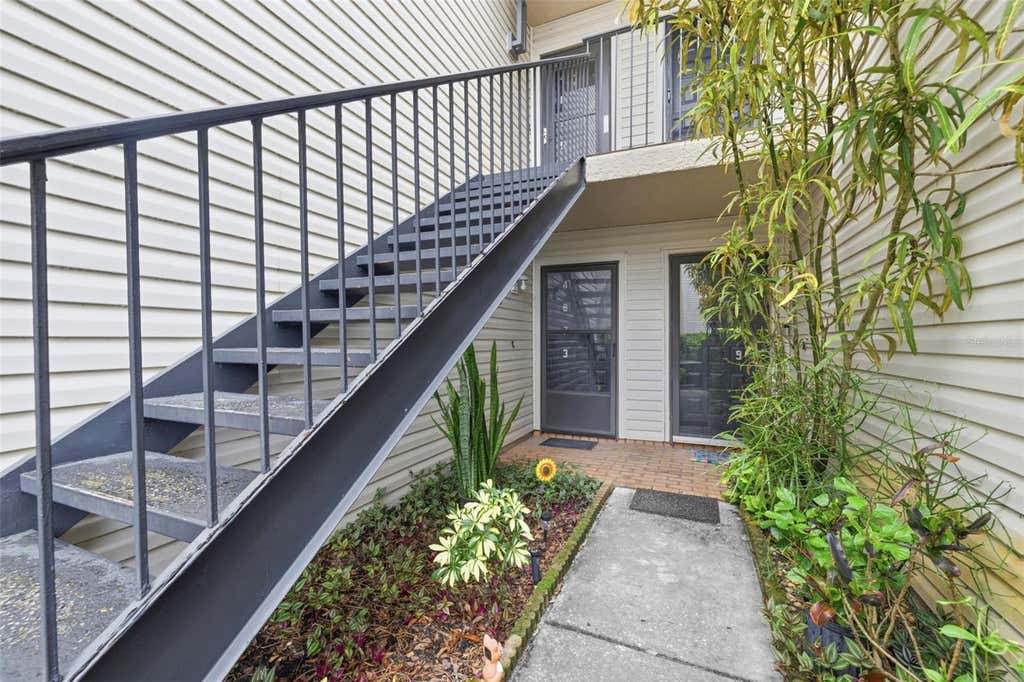 Photo of 4873 Puritan Circle #2401, Tampa, FL 33617 (MLS # TB8537279)