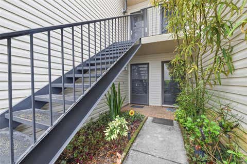 Photo of 4873 Puritan Circle #2401, Tampa, FL 33617 (MLS # TB8537279)
