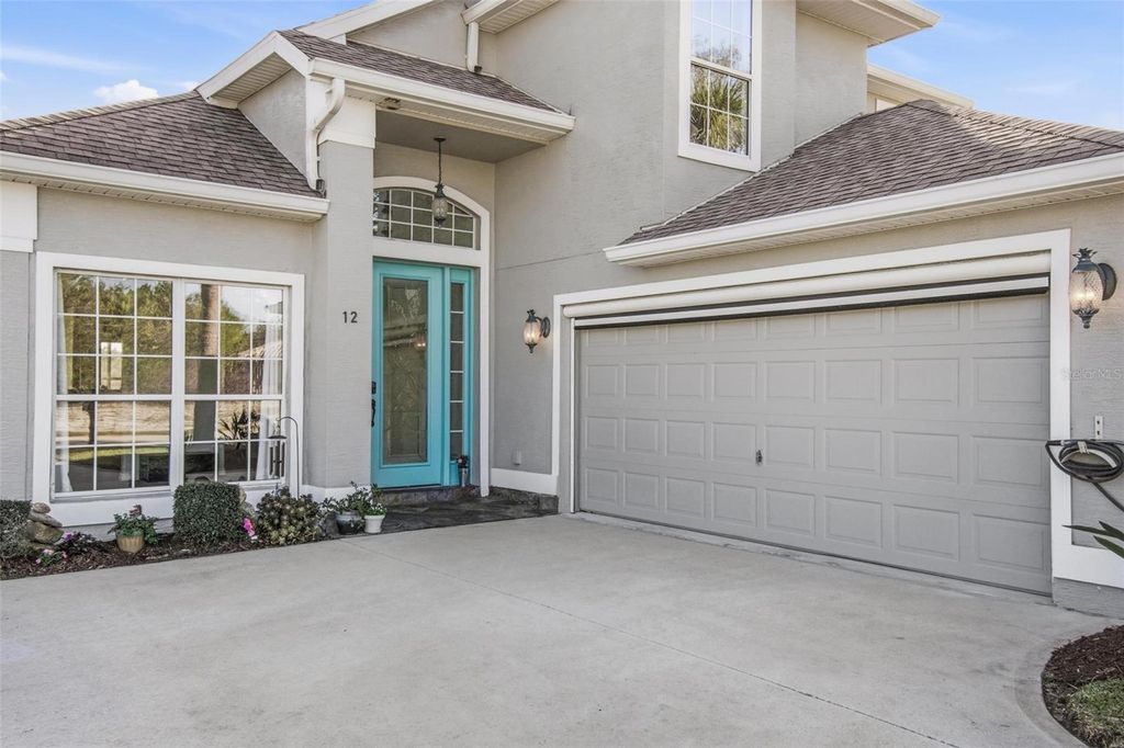 Photo of 12 S Lakewalk Drive, Palm Coast, FL 32137 (MLS # FC316774)