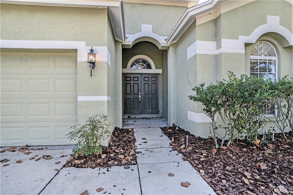 Photo of 6822 Runner Oak Drive, Wesley Chapel, FL 33545 (MLS # O6355656)
