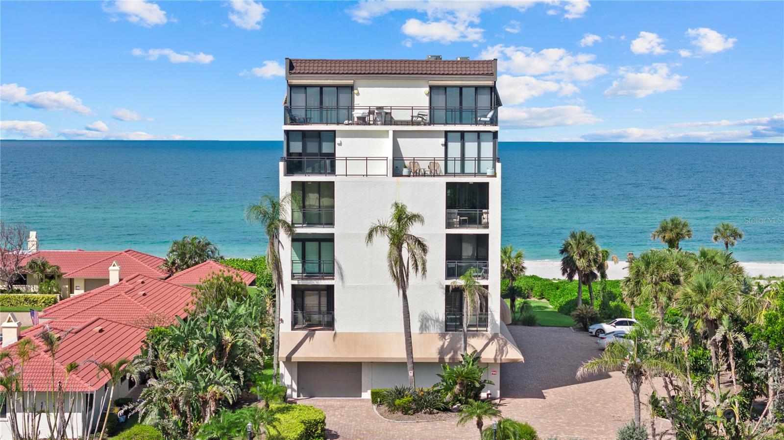 Spectacular Gulf Front Views! West Exposure With Amazing Sunset Views! This Private Boutique Building Located Directly On The Beach in Longboat Key! With Only 9 Total Units In The Building, This Condo Offers Excellent Privacy, Direct Beach Access and Resort Style Amenities at Pelican Harbour. Featuring 3 Bedrooms & 3 Washrooms, With 1660 Sq.Ft. 2 Separate Balconies and 1 Garage Parking Spot. A Spacious Open Floor Plan Includes A Wood Burning Fireplace In The Living Room, Tons of Storage and Breathtaking Views of The Gulf & Beach. Recent Upgrades Include: New Impact Sliding Doors (2024), Water Heater (2023), Washer & Dryer (2023). Pelican Harbour Amenities Include: Heated Swimming Pool, Tennis & Pickleball Courts, Fishing Pier, Kayak Launch & Owner's Marina. Marina Can Accommodate Boats Up To 28 Ft. With Slips Available. Fantastic Opportunity To Own A Large Beachfront Condo With Unobstructed Views Of The Gulf!