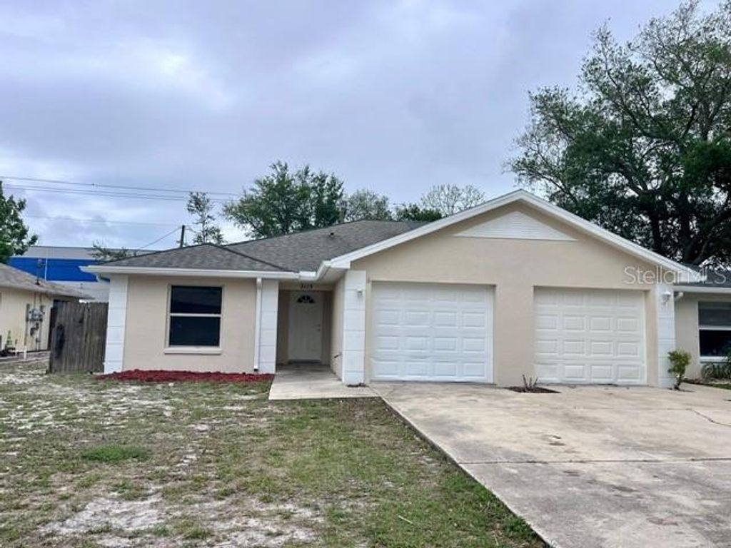 Photo of 2115 India Palm Drive, Edgewater, FL 32141 (MLS # V4948740)