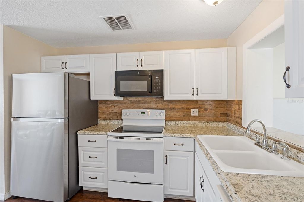 Photo of 7651 Montague Loop, New Port Richey, FL 34655 (MLS # TB8439376)