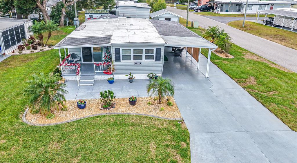 Photo of 37218 Sandra Avenue, Zephyrhills, FL 33542 (MLS # TB8454916)