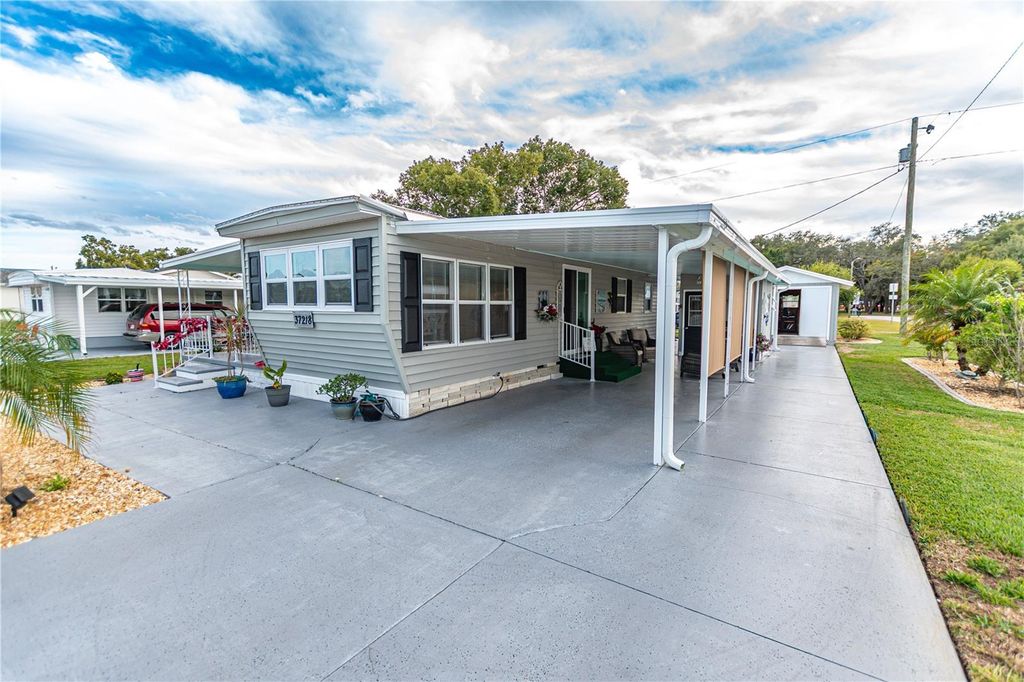 Photo of 37218 Sandra Avenue, Zephyrhills, FL 33542 (MLS # TB8454916)