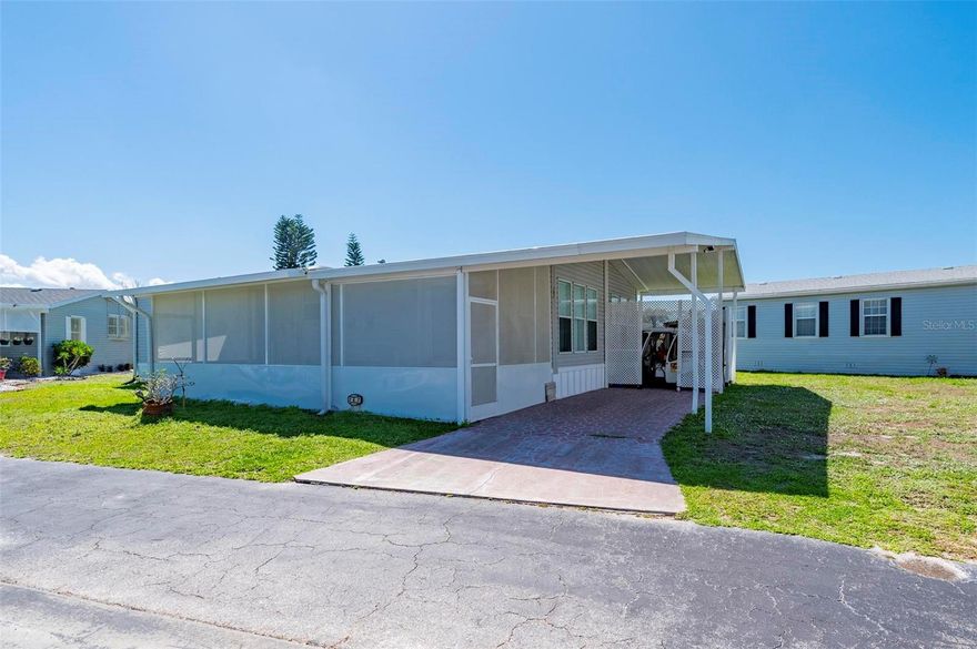 Welcome to this beautifully maintained 2-bedroom, 2-bath partially furnished Fleetwood manufactured home located in a desirable 55+ co-op community! This move-in ready home offers comfort, space, and modern updates throughout.
As you arrive, you’ll love the large front enclosed privacy-screened lanai (2021)—perfect for relaxing and enjoying Florida living year-round. Step inside through a charming breezeway entry featuring abundant storage and a statement mirror, creating both function and style.
The home boasts a spacious open floor plan, with a large living room that flows seamlessly into the open kitchen, complete with newer appliances and a generous kitchen island, ideal for entertaining or casual dining.
Both bedrooms are very spacious with large closets, while the home features vinyl flooring throughout and tile flooring in both bathrooms for easy maintenance. The primary suite is oversized and includes a luxurious en-suite bathroom with dual sinks, a separate vanity area, and plenty of space.
Major updates provide peace of mind, including a brand new HVAC system (2025) and a roof replaced in 2023.
Outside, enjoy a covered carport with golf cart parking along with a convenient storage shed for all your extra needs.
This home offers the perfect blend of comfort, functionality, and Florida lifestyle—don’t miss your opportunity to own in this sought-after community!