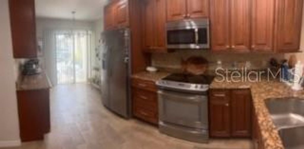 Photo of 10200 Regal Drive #3, Largo, FL 33774 (MLS # TB8437253)
