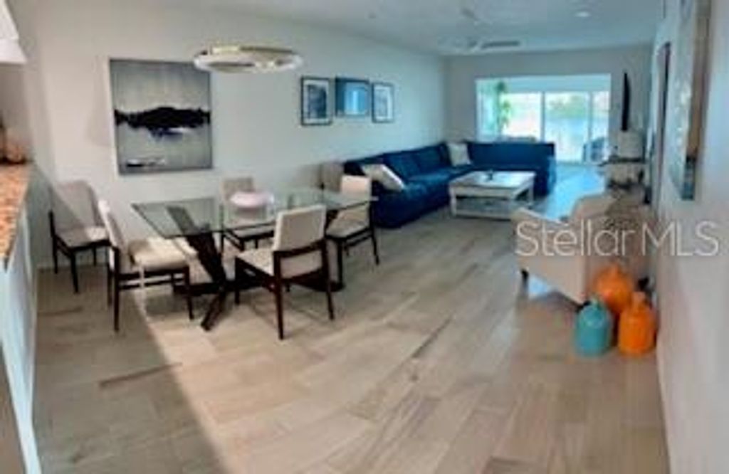 Photo of 10200 Regal Drive #3, Largo, FL 33774 (MLS # TB8437253)