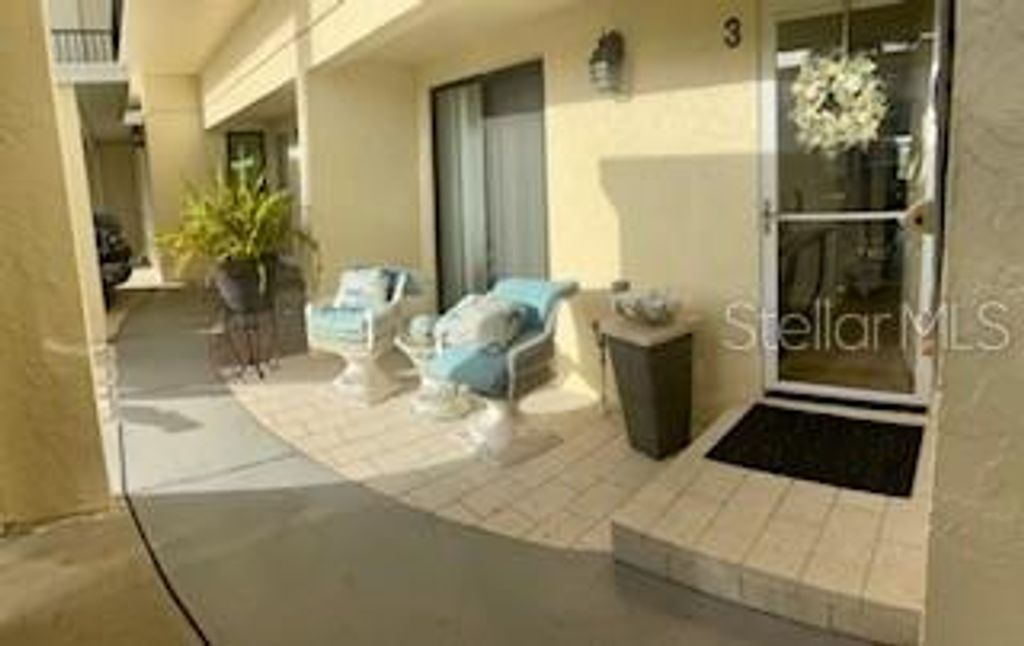 Photo of 10200 Regal Drive #3, Largo, FL 33774 (MLS # TB8437253)