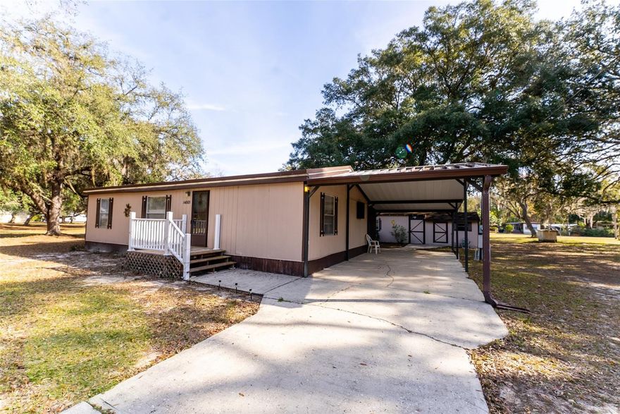 Move-in ready 3/2 home featuring a desirable split floor plan, nestled in a quiet and peaceful neighborhood in Eureka located near Fort McCoy, about 6 miles west of Lake Kerr, while Silver Springs is near Ocala, making it roughly a 15-20 mile drive. This very neat and well-maintained home offers a spacious 10x26 screened porch—perfect for enjoying your morning coffee or afternoon tea in a serene, natural setting. Conveniently located near grocery stores, Dollar General, doctors, and the post office, with just a short drive to Ocala. Outdoor enthusiasts will love the nearby Ocklawaha River and endless opportunities for four-wheeling and exploring nature. Offered completely furnished, this property is ideal as a weekend getaway, part-time retreat, or full-time residence. Just bring your suitcase and start enjoying the Florida lifestyle.