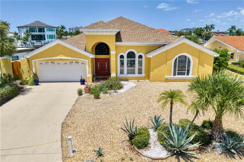 Photo of 115 Aleta Drive, Belleair Beach, FL 33786 (MLS # TB8524388)