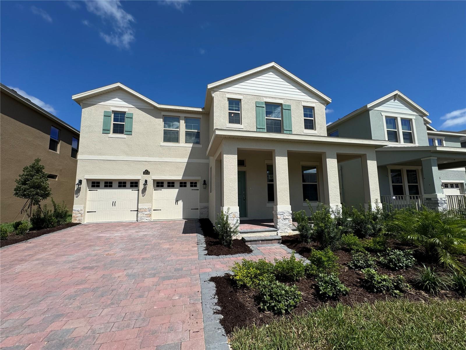 Waterleigh presents the Seacliff. This two-story all concrete block construction single-family home features 4 bedrooms and 3.5 bathrooms optimizing living space with an open concept feel. A beautiful porch welcomes you to this home, as you enter the foyer, you are greeted with a formal dining room. Go down the hallway and you’ll find a powder room and laundry room tucked behind the stairwell leading up to the second floor. The well-appointed gourmet kitchen overlooks the casual dining area, family room and outdoor lanai. This home features a spacious kitchen island with built in sink and dishwasher to optimize counter space, and a walk-in pantry for extra storage. All homes in this community will have stainless steel appliances, making cooking a piece of cake. Bedroom one is located off the living space in the back of the home for privacy. The bedroom one bathroom impresses with separate vanities, shower/tub space, toilet room with privacy door as well as a spacious walk in closet. As we head upstairs, you are greeted with a loft area and all three bedrooms. Two bedrooms share an upstairs bathroom with double bowl vanity while the additional bedroom is complete with ensuite bathroom. Like all homes in Waterleigh, the Seacliff includes a Home is Connected smart home technology package which allows you to control your home with your smart device while near or away. The house is close to a newly built swimming pool. The community enjoys a prime location, with Publix right at the entrance. It also includes a day care, two elementary schools, and one middle school, and is only 10 minutes from Disney.