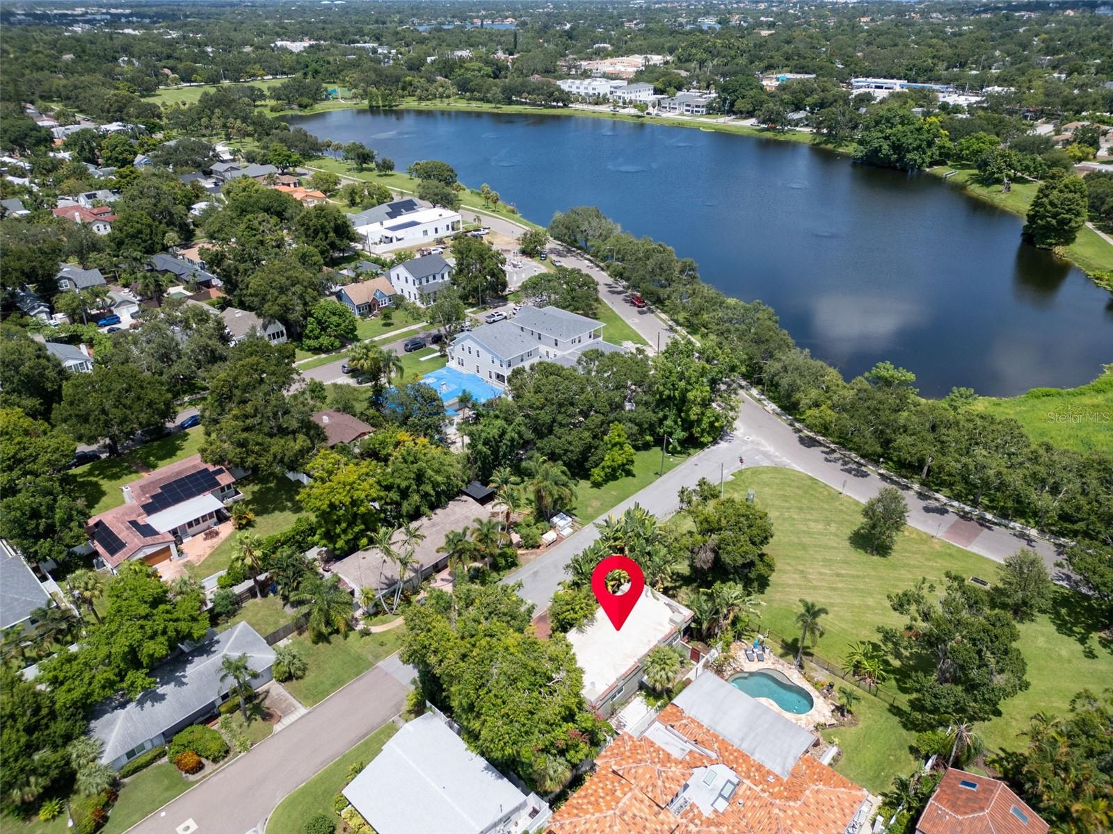 Nestled front and center onto the remarkable Crescent Lake Park, this is 2-bedroom, 2-bathroom opportunity presents a canvas bursting with possibilities. The home offers a commanding
presence overlooking broad, public parkland that’s directly maintained by the city—meaning stunning vistas of the lake paired with effortless curb appeal.
The neighborhood lifestyle is truly in a league of its own. A full-cohort of amenities awaits within walking distance—pickleball and tennis courts, a dog park, playgrounds, and jogging trails
looped around Crescent Lake. Families, fitness lovers, and dog owners alike will appreciate the ease of access to these vibrant communal spaces.
Step outside your door and discover the exceptional St. Petersburg lifestyle. Enjoy leisurely strolls around the lake, weekend meet-ups, or explore nearby downtown’s dining, arts, and cultural
scene—all just blocks away The neighborhood strikes the perfect balance between tranquil park-side living and fast, walkable proximity to urban energy and amenities.
Inside, the home offers two bedrooms and two baths, including a master suite with its own bath and walk-in closet—ideal as a thoughtful layout for a remodel or rebuild. But the real draw here
lies in the location and land—the value, views, and lifestyle are the true highlights.
This property is an outstanding opportunity for investors, builders, or visionaries seeking to create a bespoke residence in one of St. Petersburg’s most beloved and walkable neighborhoods.
With its parkside setting, lake views, and access to renowned community amenities, this is a rare chance to build dream living from the ground up.