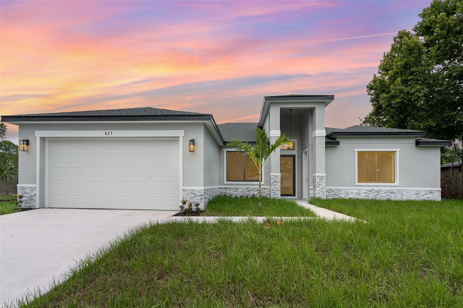 MULTIGENERATIONAL LIVING IS HERE! Have an aging parent or need extra space for family? This home is perfect for multigenerational living, featuring a separate entry and private bathroom, ensuring both privacy and comfort. Discover modern living in Palm Bay, close to shopping, dining, and more. This new build features 4 bedrooms, 3 full baths, office, and 2,108 sq ft under air. The sleek kitchen boasts a 9'x4' granite island with dual waterfall edges, Samsung appliances, and custom soft-close cabinets. 9.4' ceilings and all porcelain tile flooring throughout add a spacious feel. The primary suite includes double sinks, a tub, walk-in shower, and walk-in closet. Enjoy a covered rear patio. This home includes 1-year builder warranty, and 10 year structural warranty.