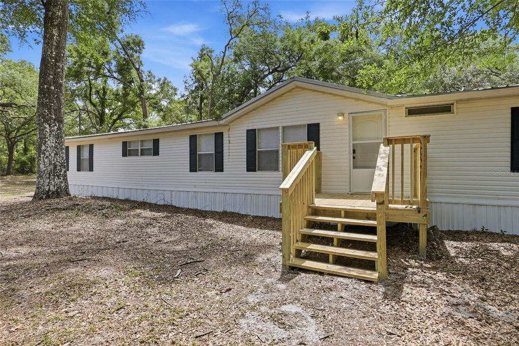 Photo of 7651 NW 153rd Lane, Chiefland, FL 32626 (MLS # GC540158)