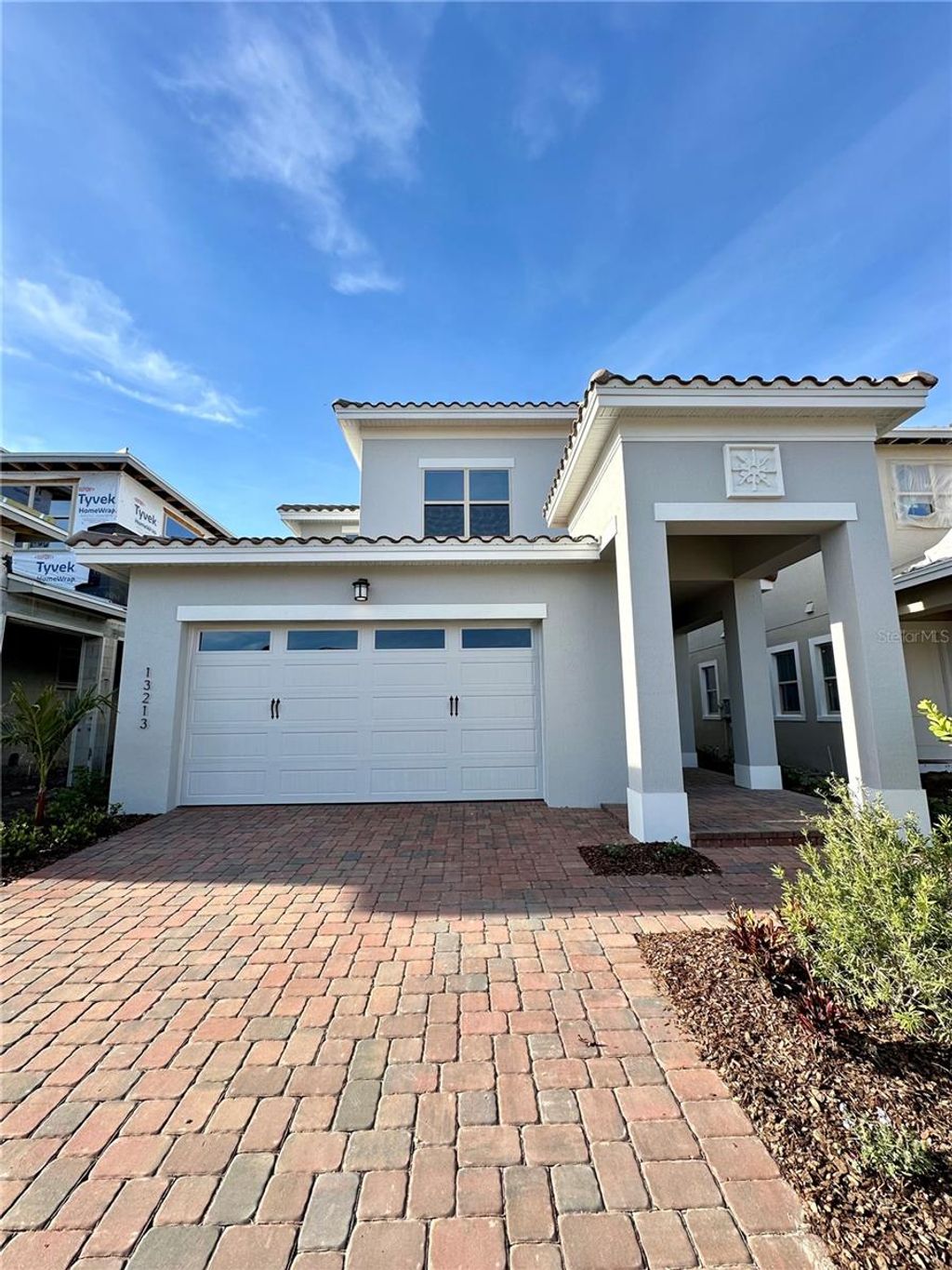 Photo of 13213 Winterton Lane, Orlando, FL 32832 (MLS # O6376089)