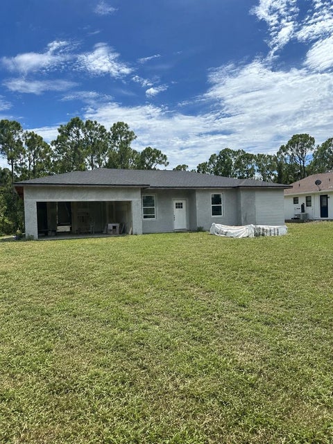 Photo of 23439 Corinne Avenue, Port Charlotte, FL 33980 (MLS # O6439122)