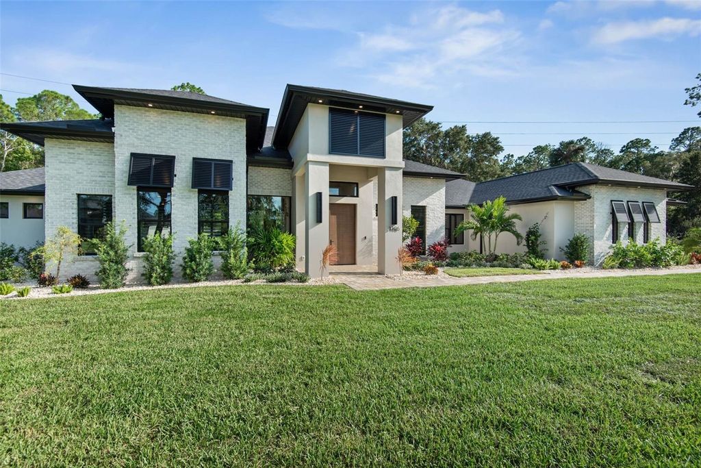 Photo of 3106 Crossing Pine Lane, New Smyrna Beach, FL 32168 (MLS # NS1086361)