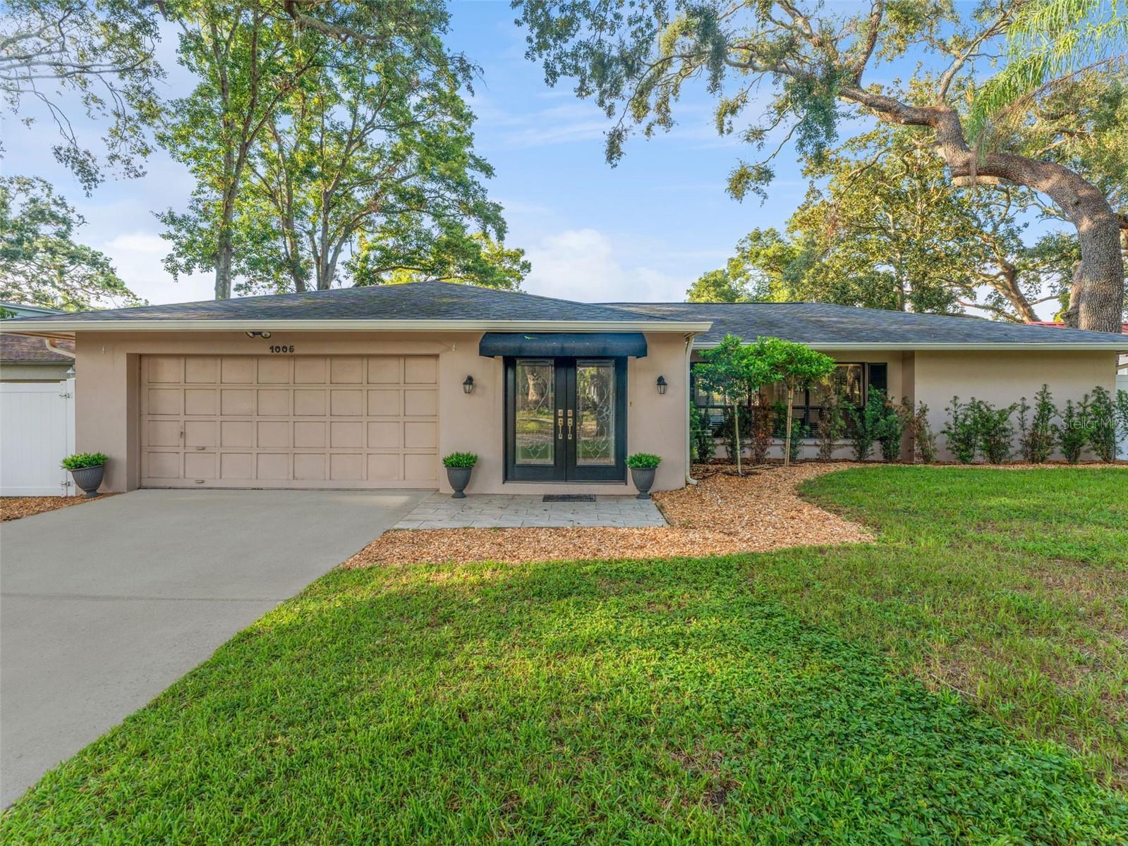 Lake life is calling! Welcome to 1005 Samy Drive, where comfort and relaxation meet Florida’s natural beauty. This 3-bedroom, 2-bath
home boasts nearly 1,900 sq. ft. of living space with sweeping views of the lake right from your backyard. Your lot goes across the entire
lake! Ready for your fishing, kayaking and more! When done, relax in your oversized, heated salt water pool. Step inside to discover a bright, open layout perfect for entertaining, with spacious living and dining areas that flow seamlessly to the outdoor oasis. The private pool and patio area was recently painted and provides the ultimate spot for gatherings or quiet evenings watching the sunset over the water. The oversized owners suite has its own bathroom and walk-in closet. Split layout offers two
generous sized bedrooms on the other side of the home sharing a hall bath (which also serves as your pool bath.) Recent updates:
New Septic System (tank and drain field 2024) , new water heater (2025), new dock and seawall (2020), new water softener (2024), newer kitchen appliances (2020). Quiet street that provides easy access to USF and downtown Tampa. Mature
trees and lake living create a unique private retreat in the heart of the Lake Magdalene area.
This lakefront gem is ready for your personal touch—schedule your private showing today!
