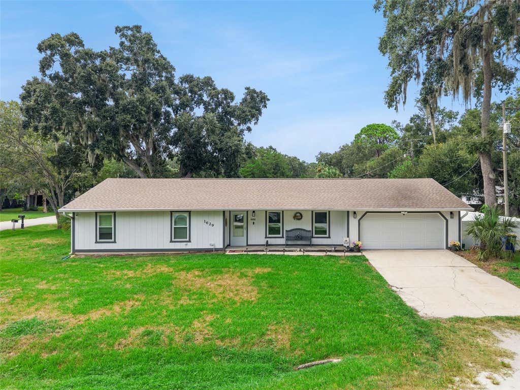 Photo of 1629 Orange Tree Drive, Edgewater, FL 32132 (MLS # V4950948)