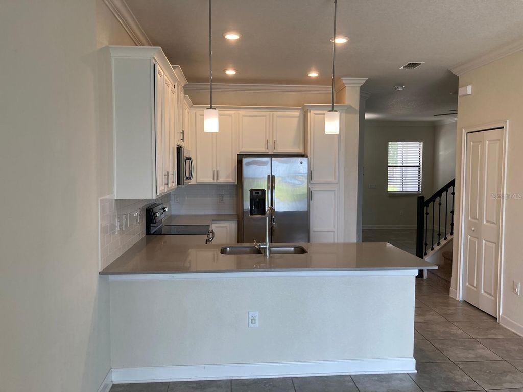 Photo of 1348 Royal St George Boulevard, Davenport, FL 33896 (MLS # S5153176)