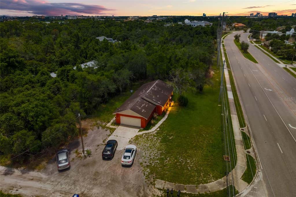 Photo of 11253 S Apopka Vineland Road, Orlando, FL 32836 (MLS # O6428305)