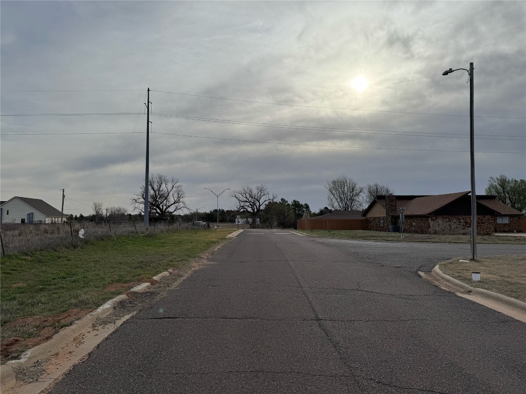 View of street on South side of property looking E