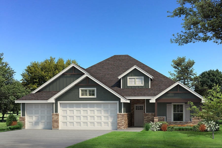 Craftsman inspired home featuring driveway, a gara