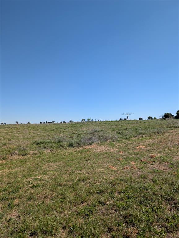 Expansive open land view from road