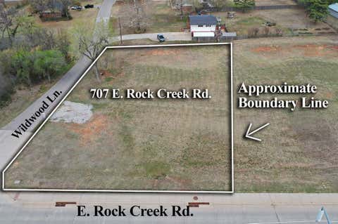Photo of 707 E Rock Creek Road Road, Norman, OK 73069 (MLS # 1221376)