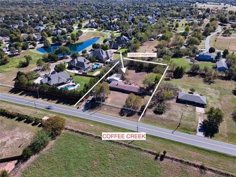 Photo of 834 E Coffee Creek Road, Edmond, OK 73034 (MLS # 1251924)