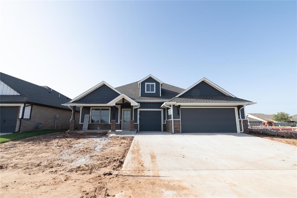 Spacious interior framing showcasing a dual-pane glass door with transom, multiple windows, and a built-in fireplace