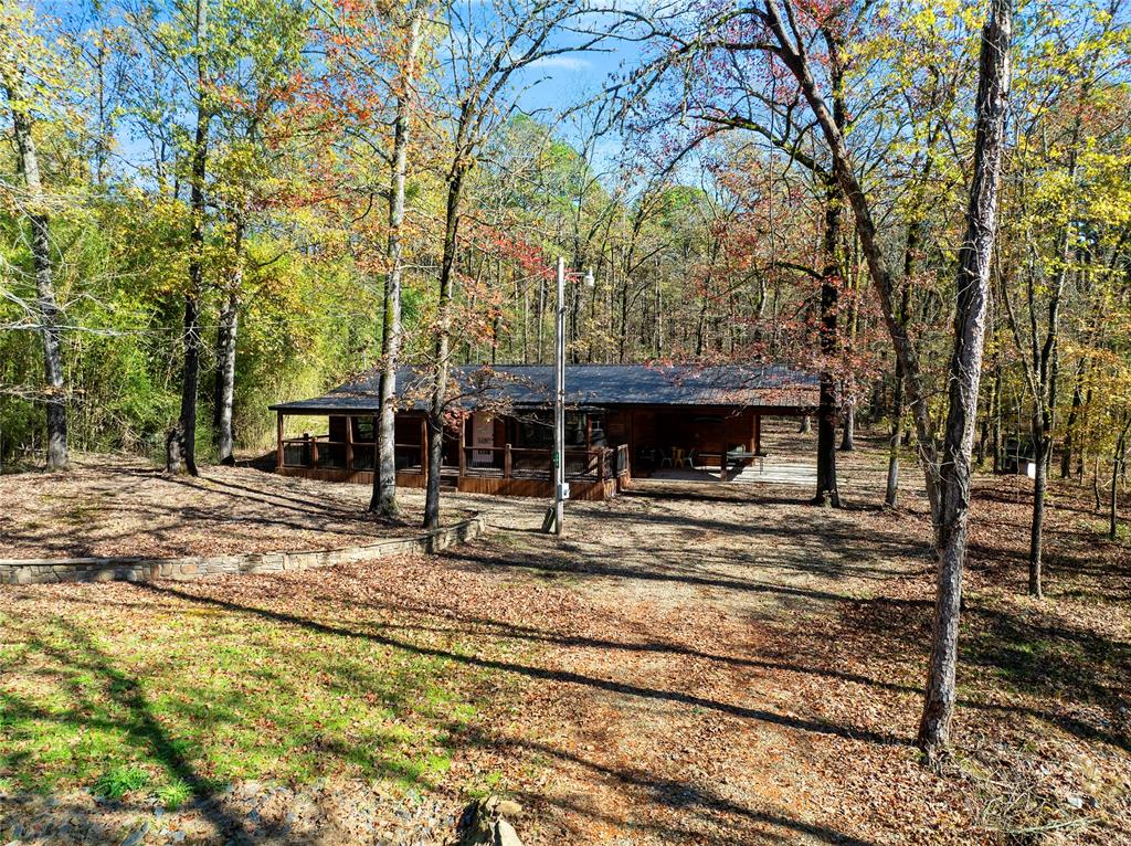 View of outbuilding with a carport