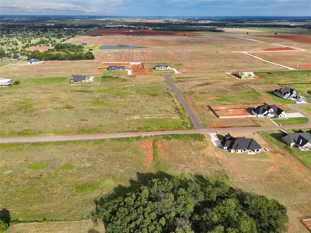 Aerial view of sparsely populated area with abundant farmland and property boundaries highlighted