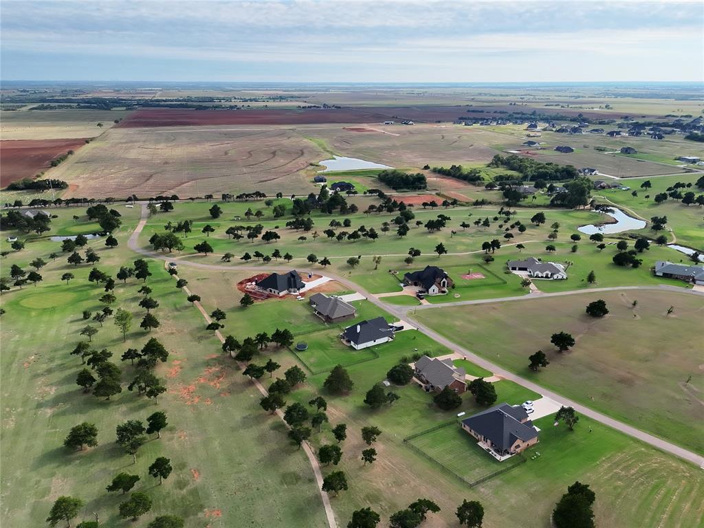 Aerial overview of property's location featuring a large body of water