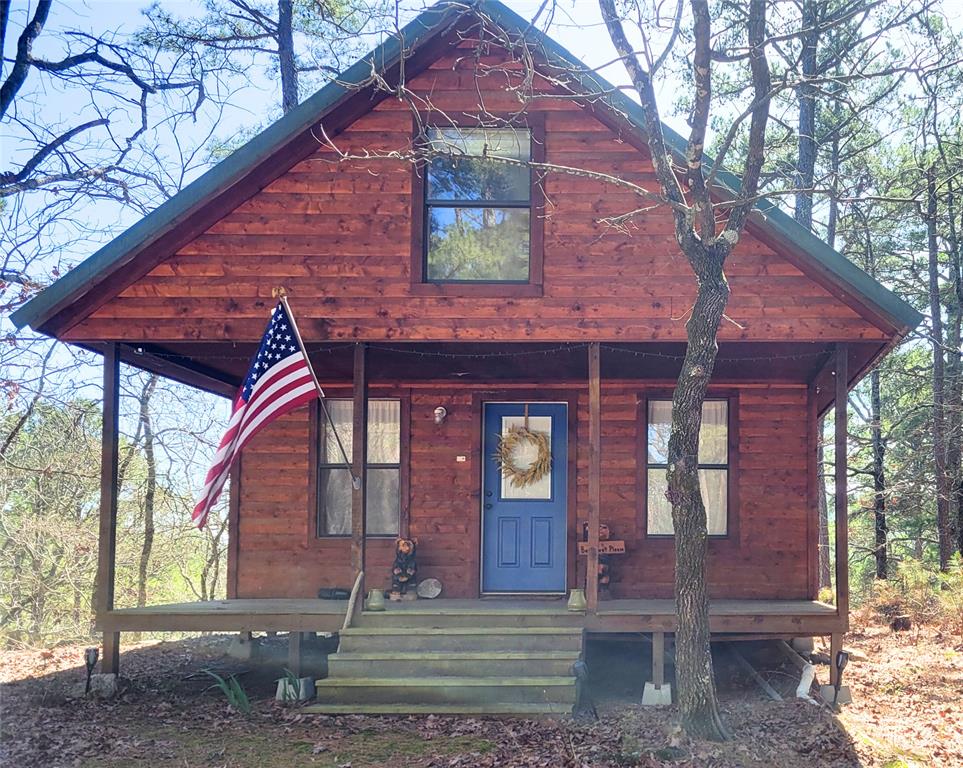 Rustic home with covered porch