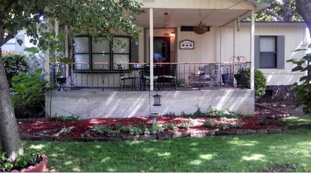 View of front of home featuring covered porch