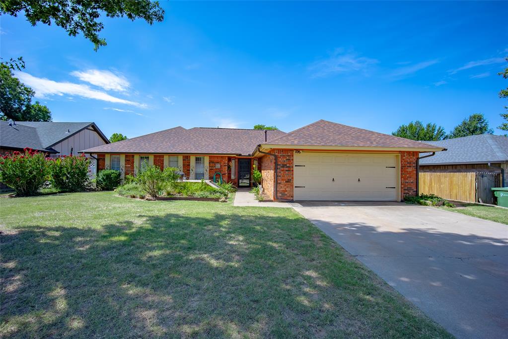 Brick exterior with an attached two-car garage