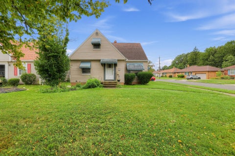 Photo of 12112 Thraves Avenue, Garfield Heights, OH 44125 (MLS # 226037447)