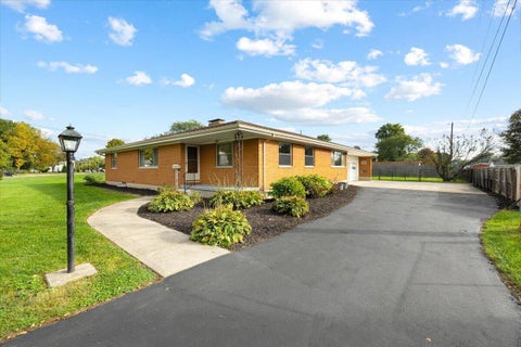 Photo of 606 W Lake Avenue, New Carlisle, OH 45344 (MLS # 226039694)