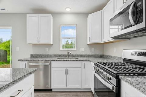 Photo of 908 Eastern Avenue, Bellefontaine, OH 43311 (MLS # 226005386)