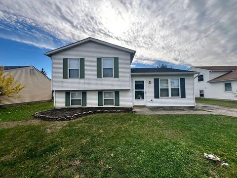 Photo of 1597 Rock Creek Drive, Grove City, OH 43123 (MLS # 225043888)