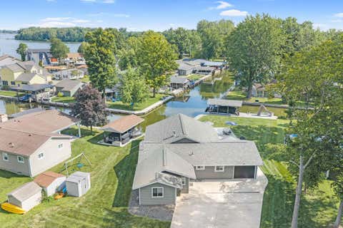 Photo of 9024 Walnut Street, Huntsville, OH 43324 (MLS # 226030273)