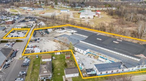 Photo of 1101 Woodlawn Avenue, Cambridge, OH 43725 (MLS # 226001602)