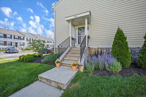 Photo of 7043 Monarchos Drive 13 #13, New Albany, OH 43054 (MLS # 226023766)