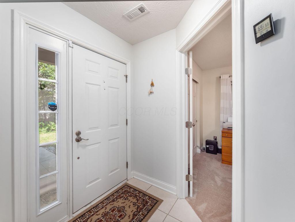 Photo of 434 Hidden Ravines Drive, Powell, OH 43065 (MLS # 226011998)