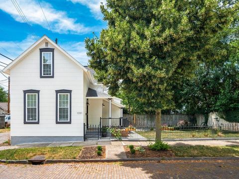 Photo of 1091 S Washington Avenue, Columbus, OH 43206 (MLS # 225038777)