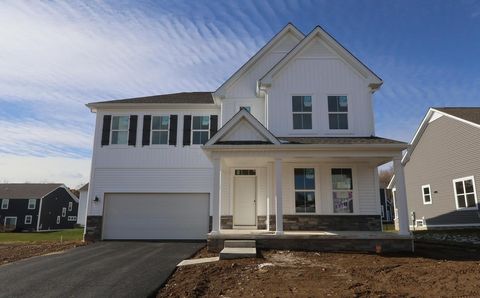 Photo of 310 Reign Way, Pataskala, OH 43062 (MLS # 225042912)